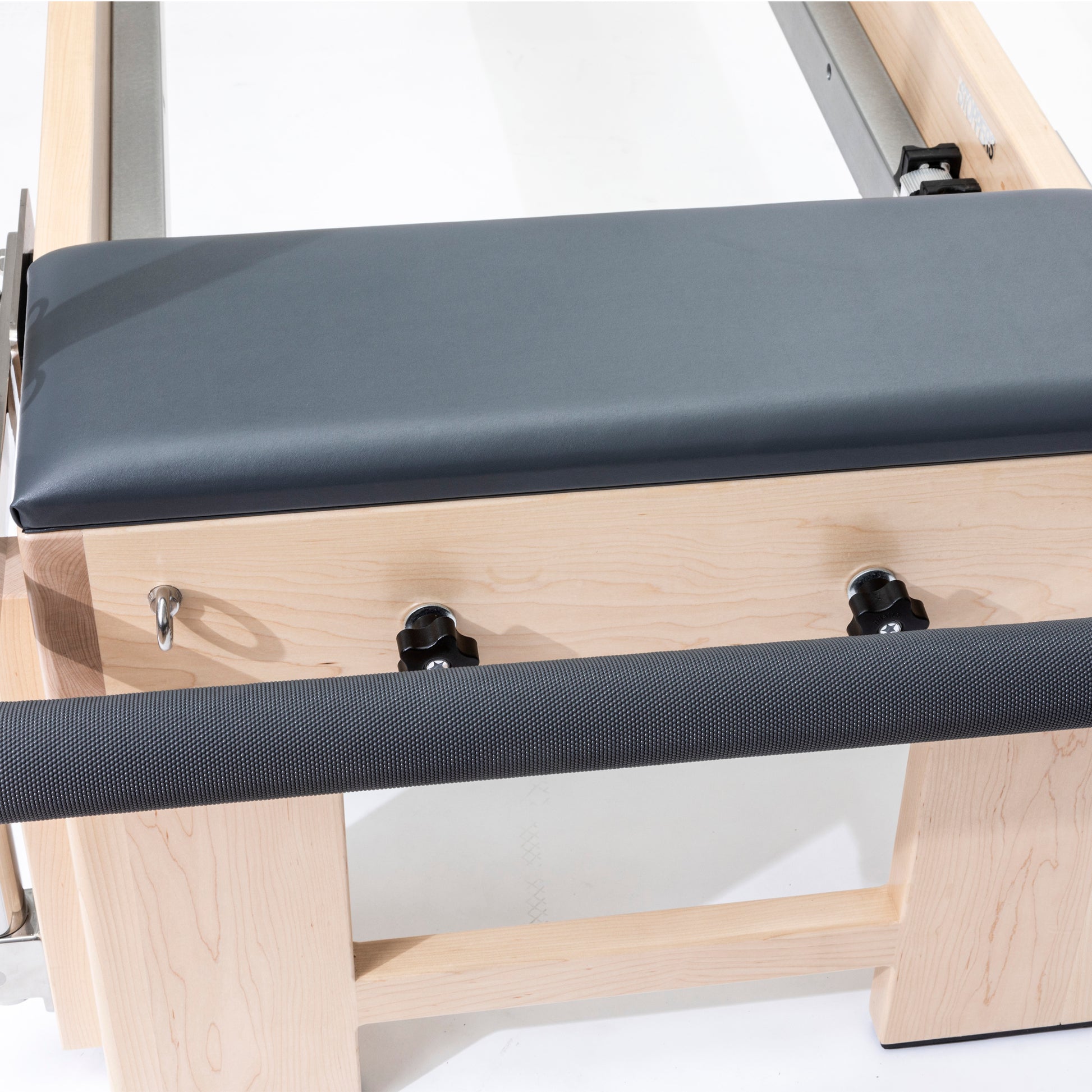 Professional Pilates Cadillac Reformer Elite with solid wood frame and grey padding