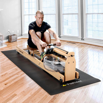 Person using rowing machine on Topiom non-slip fitness mat in home gym