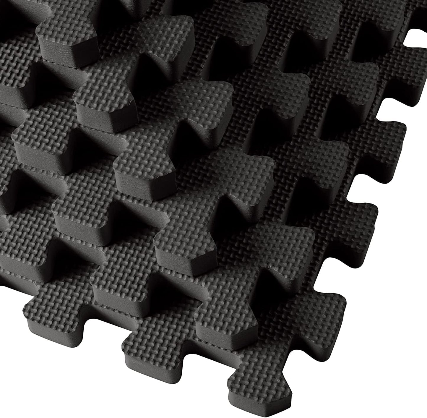 Close-up view of We Sell Mats 1-inch EVA foam tiles showing precision interlocking edges for secure and seamless fit