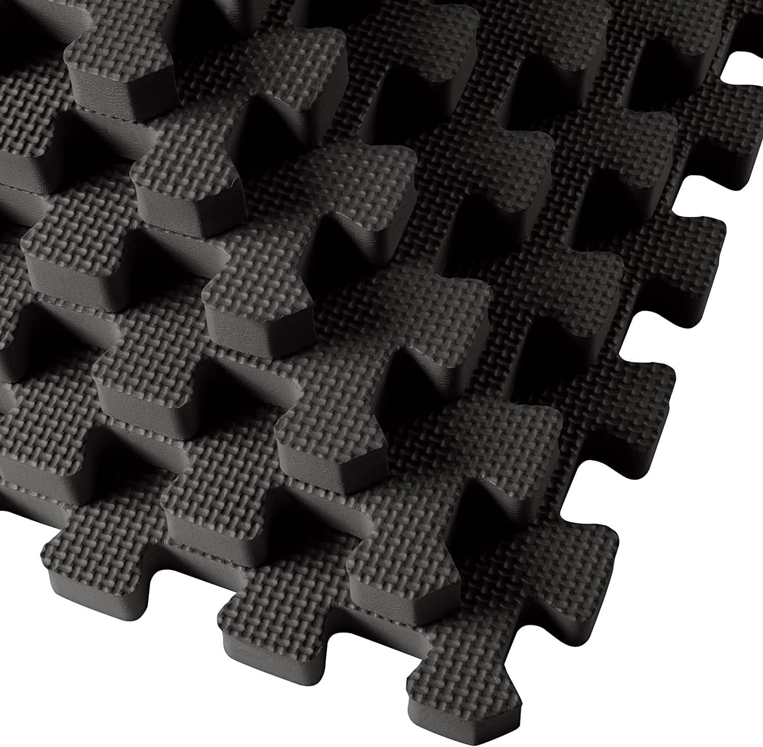 Close-up view of We Sell Mats 1-inch EVA foam tiles showing precision interlocking edges for secure and seamless fit