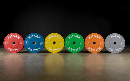 Color-coded Olympic bumper plates in all weight options