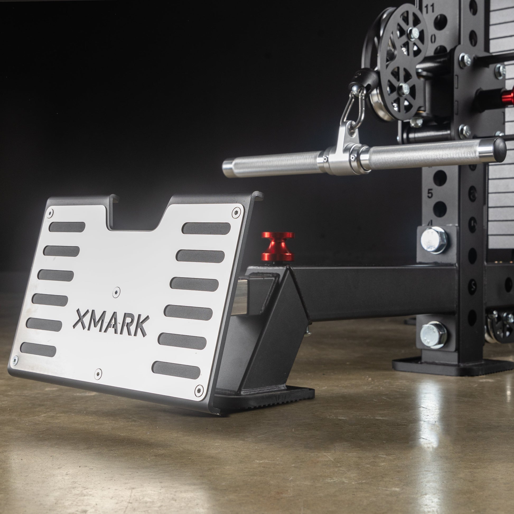 Footstand attachment for seated row exercises on XMark Commercial Hybrid Functional Trainer