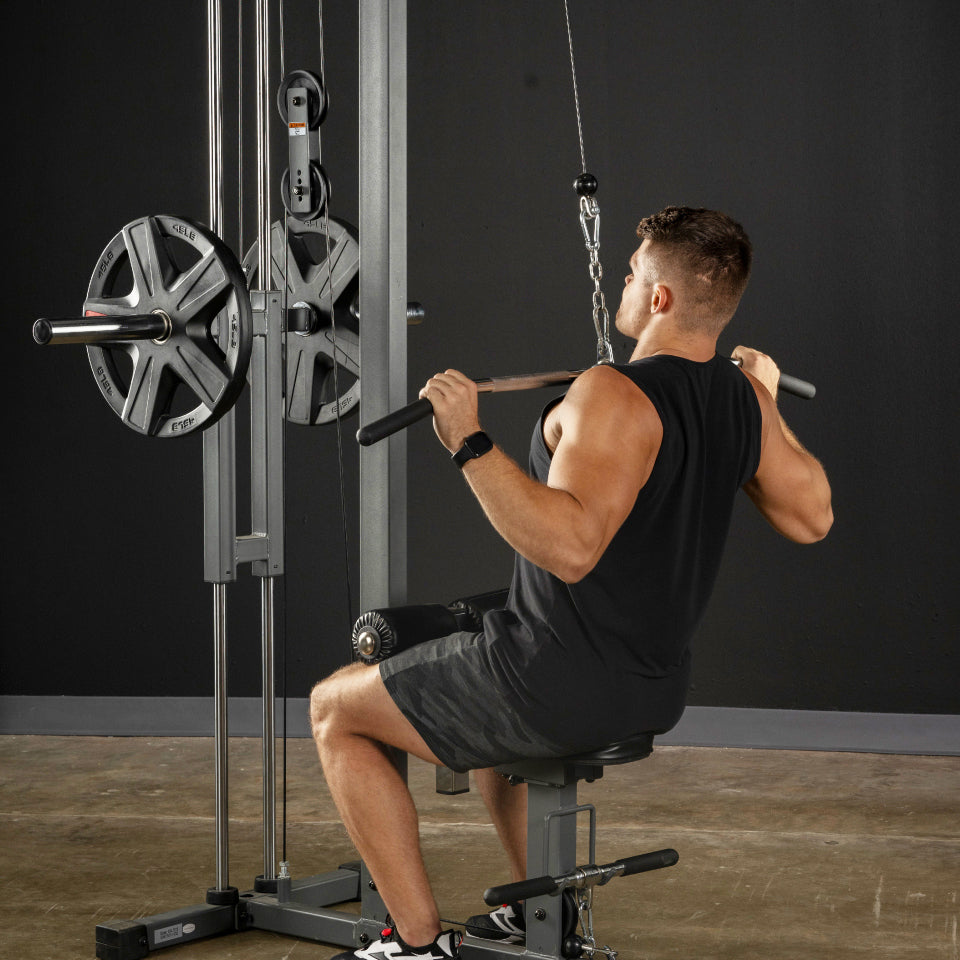 Lat pulldown on the XMark Lat Pull‑Down Machine with Low‑Row station