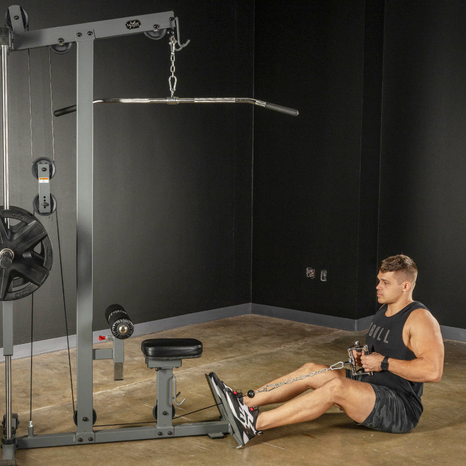 Low row on the XMark Lat Pull‑Down Machine with Low‑Row station